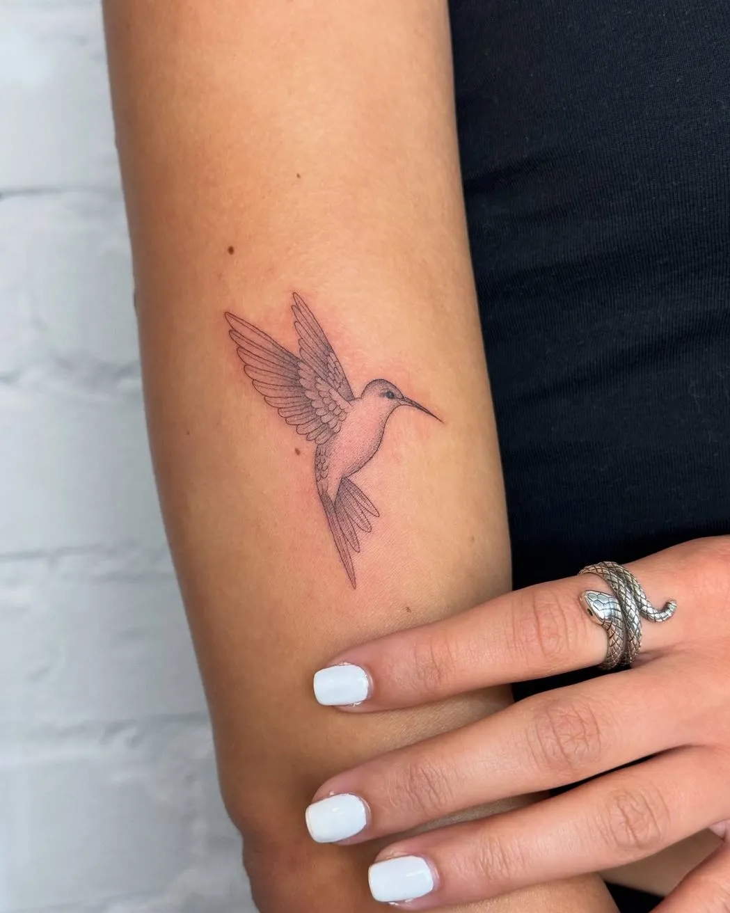 Do I need a license to practice fine-line tattooing?